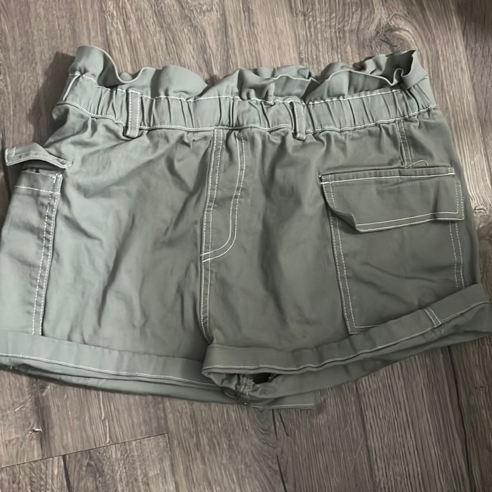 Green with white lacing shorts.